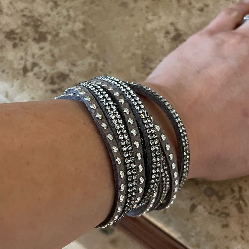 Faux suede sparkly bracelet. New with box.